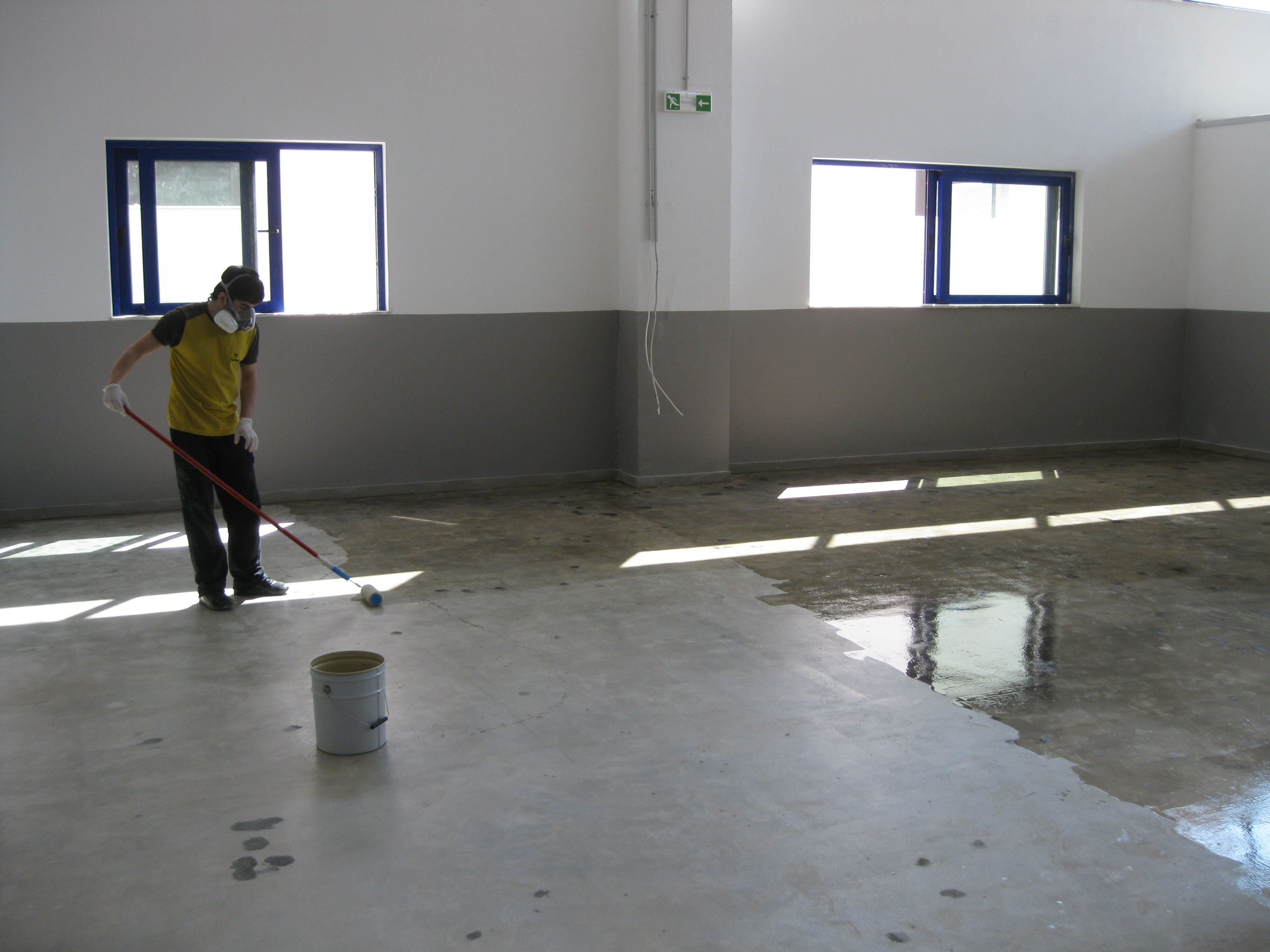 priming concrete floor with epoxy