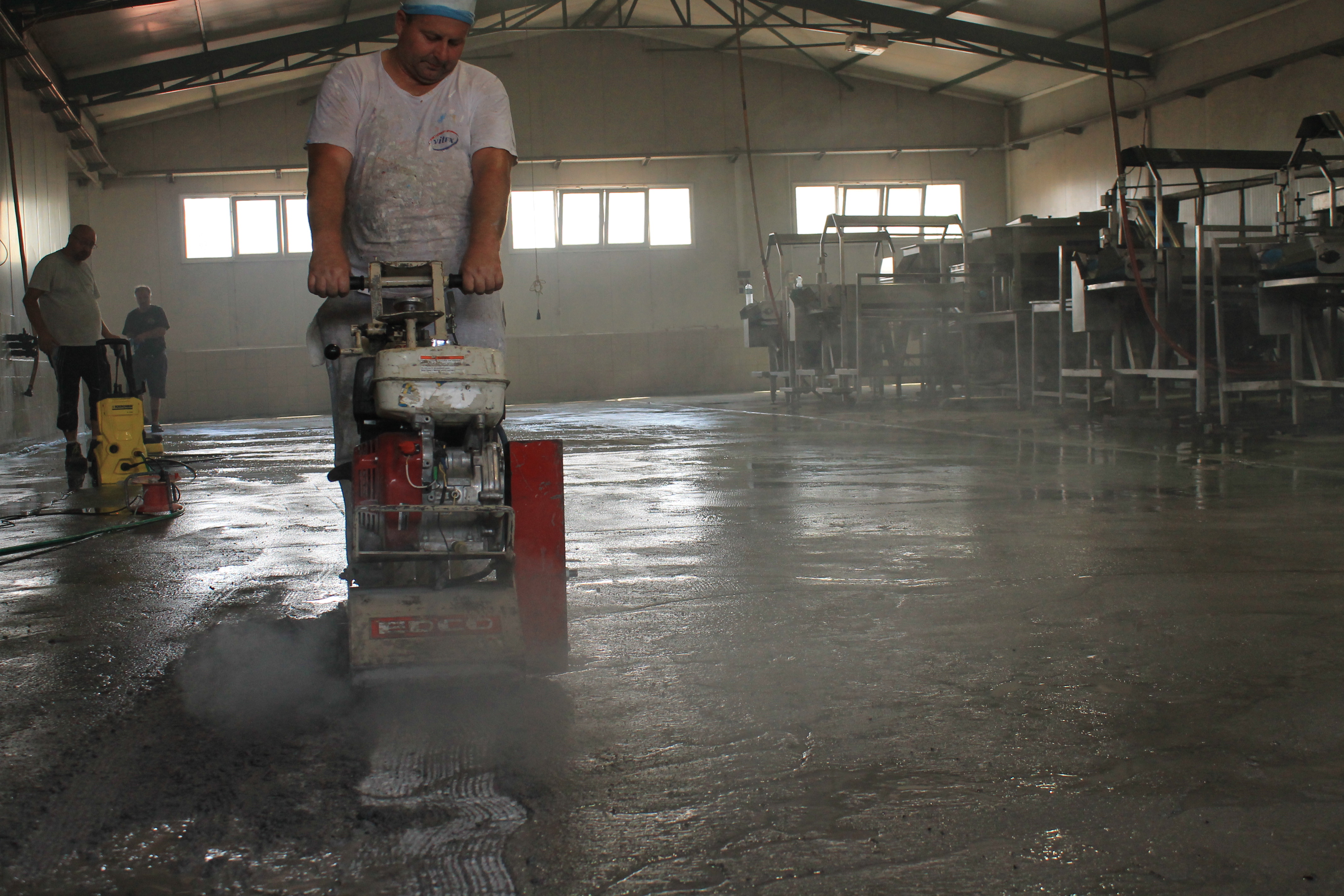 scarifying concrete floor before epoxy coating