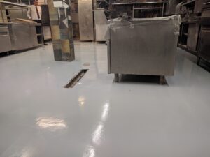 an epoxy floor over tiles